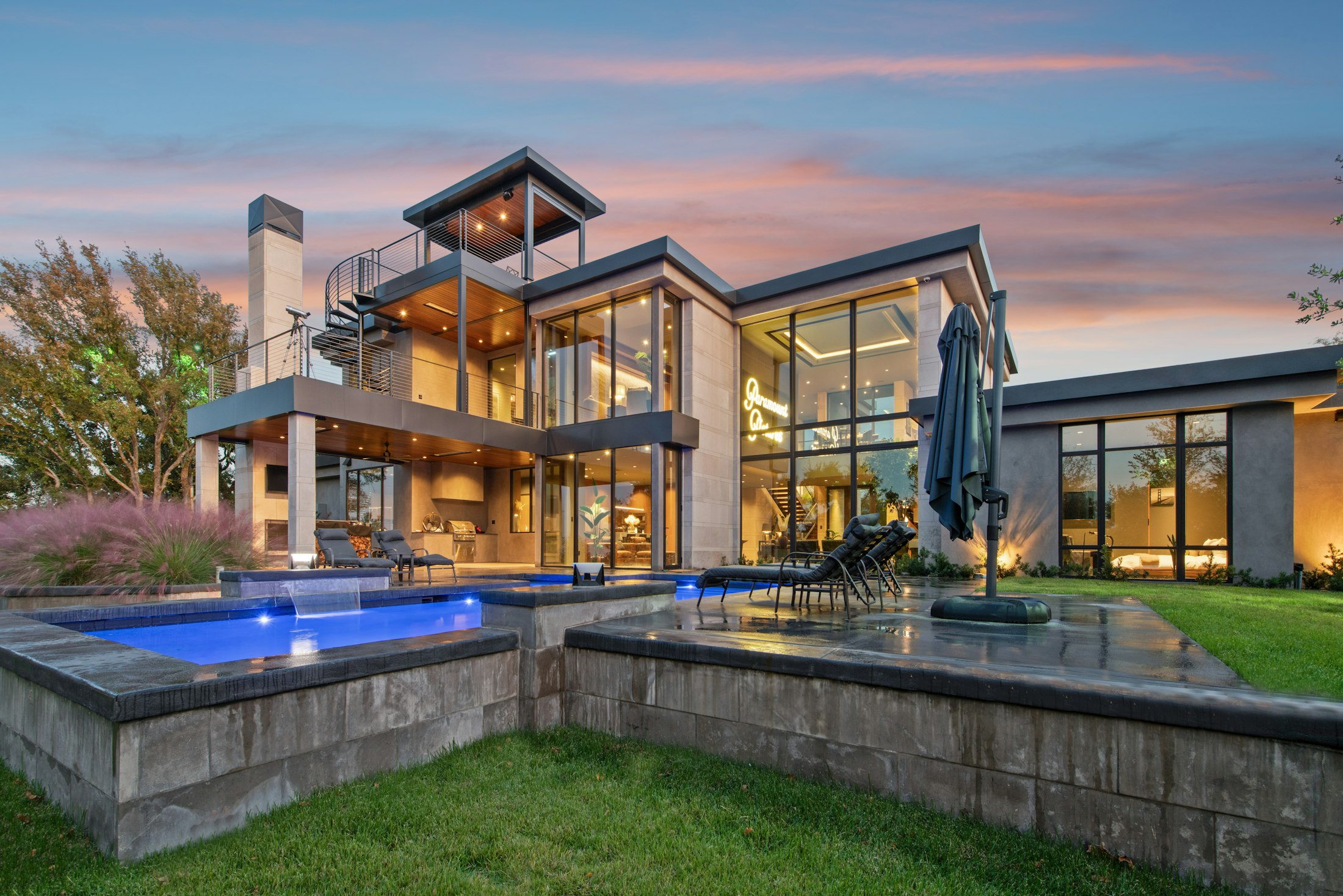Luxury residential pool villa at dusk